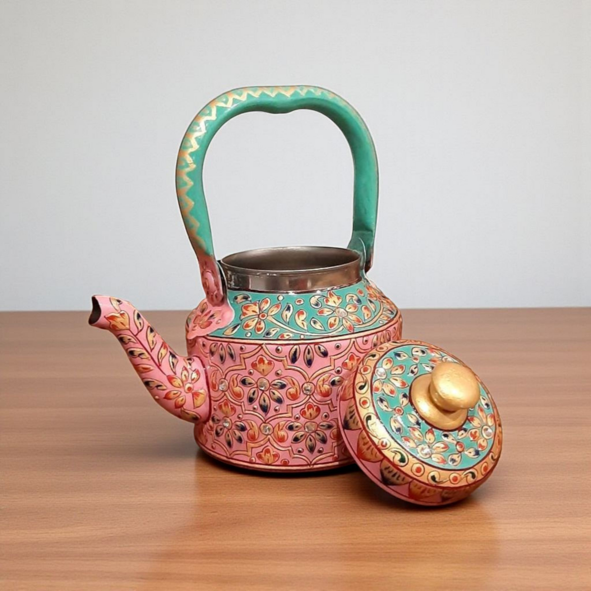 Stainless steel 1L functional teapot with floral patterns by Dastkaari