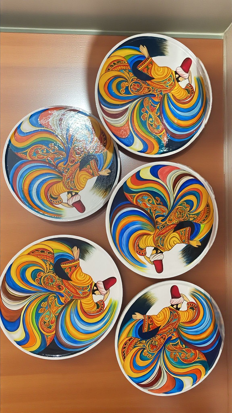 Colorful 12" Mango wood wall plate or table art with a whirling dervish by Dastkaari