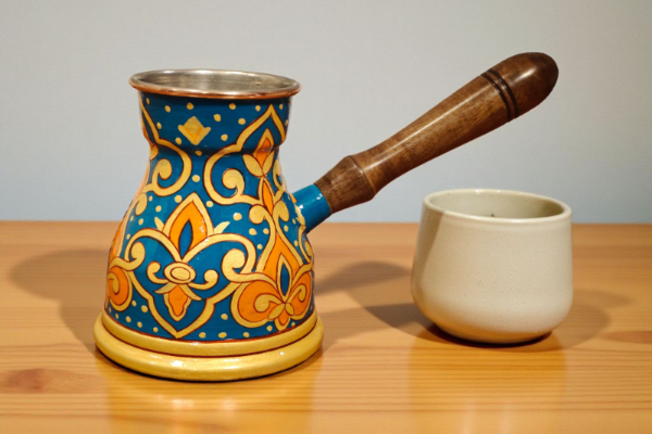 Ayurvedic benefits of copper from a pot painted with history on it exclusively by Dastkaari