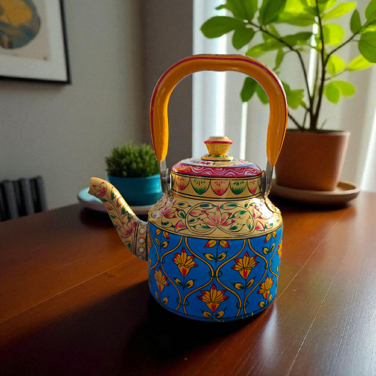Close up of hand-painted floral design on stainless steel tea kettle 1L by Dastkaari