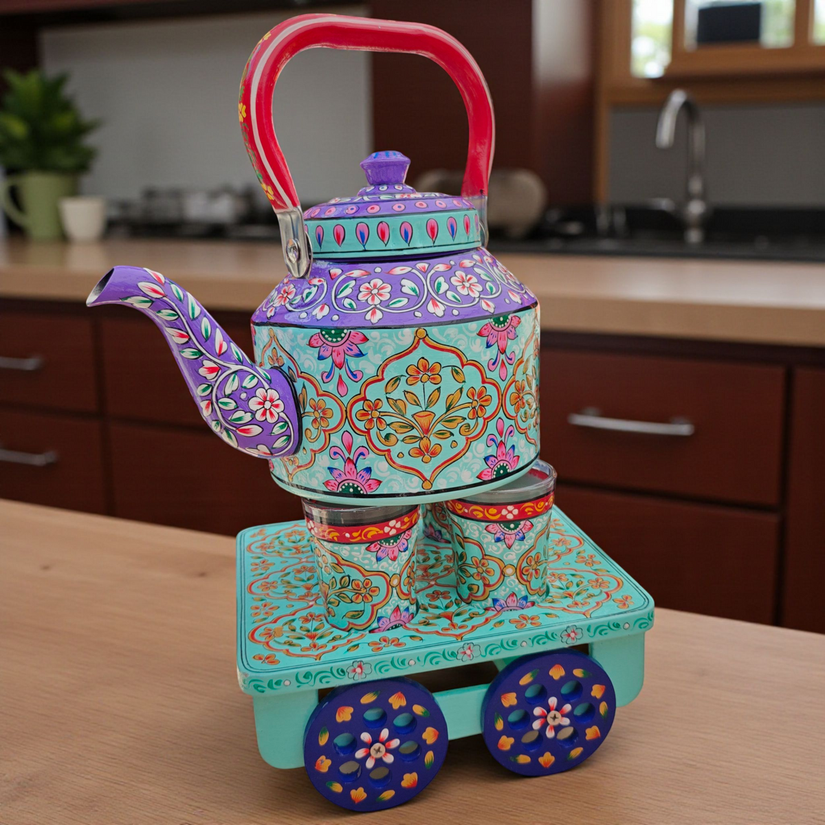 Decorative functional 1.5L stainless steel  tea kettle on a rolling tea glass rairi by Dastkaari